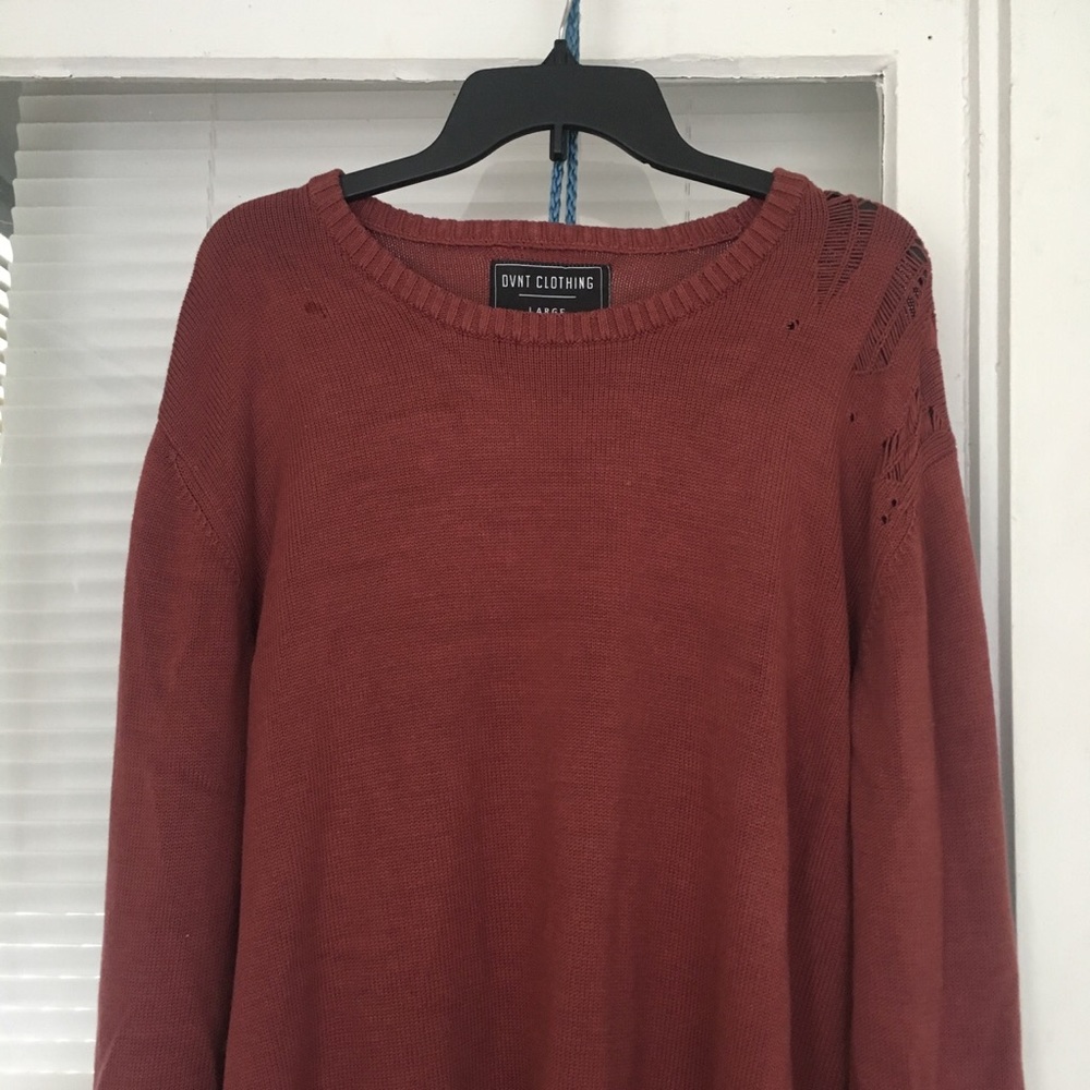 Distressed long cotton knitted sweater in rust